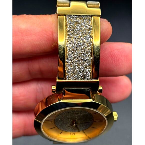 Guess Aurora Women\'s Gold-Tone Stainless Steel & Zwarovski Crystals Bangle Watch main image 4
